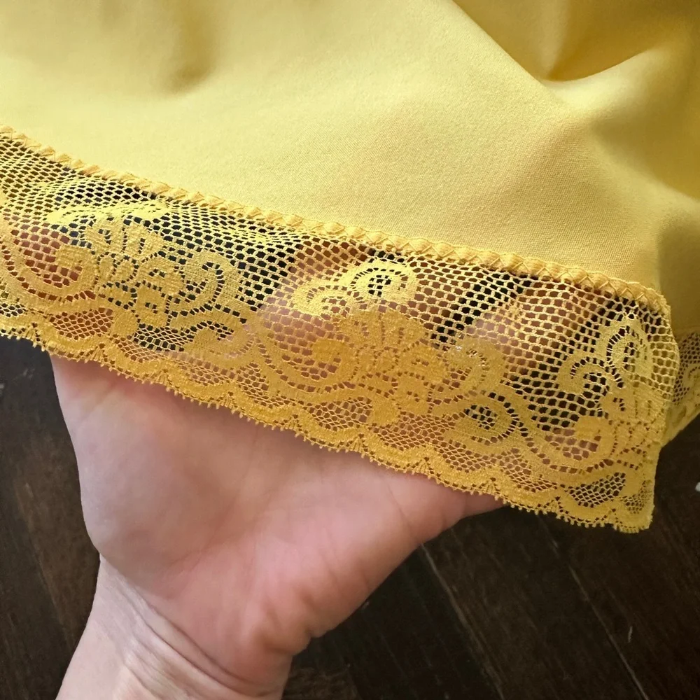 Vintage round yellow tablecloth with lace trim